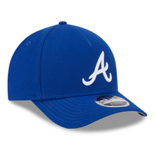 Load image into Gallery viewer, A royal blue baseball cap featuring a white embroidered Atlanta Braves 'A' logo on the front, with a silver and black New Era 9FORTY sticker on the visor.