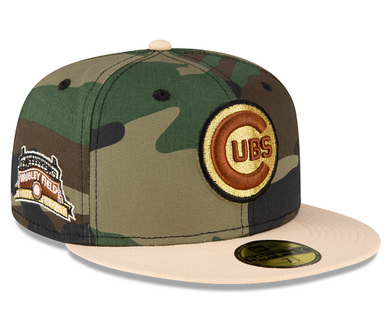 Camouflage baseball cap with Cubs logo on a tan background with a  tan visor and a Wrigley field side patch.