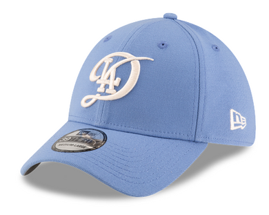 Blue baseball cap with a White Los Angeles Cursive logo on a light blue background