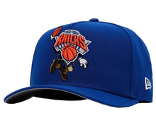 Load image into Gallery viewer, A royal blue New York Knicks baseball cap by New Era, featuring a large embroidered team logo on the front and a small white New Era flag on the side.