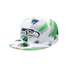 Load image into Gallery viewer, Seattle Seahawks New Era 9Fifty 950 Paint Splatter Snapback Hat