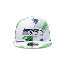 Load image into Gallery viewer, Seattle Seahawks New Era 9Fifty 950 Paint Splatter Snapback Hat